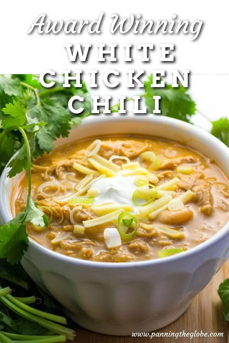 Bowl of award winning white chicken chili topped with cilantro