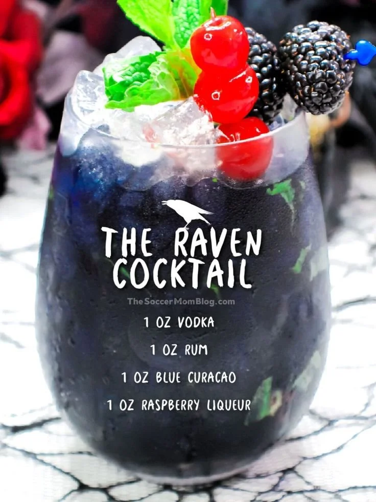 Black Raven Cocktail served in a spooky Halloween-themed glass.