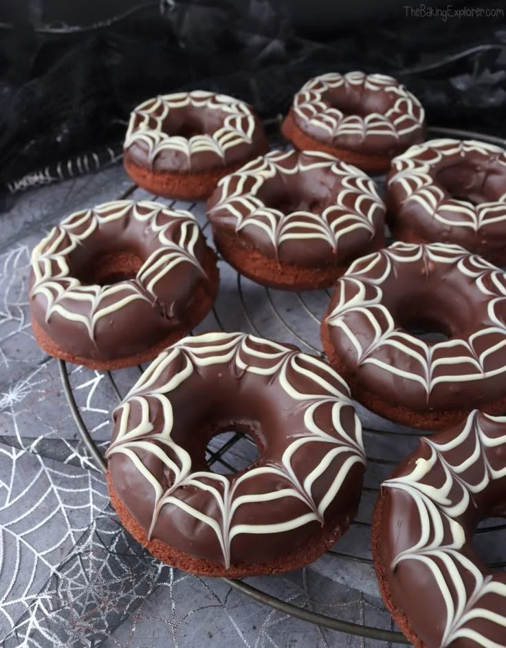 Chocolate Spiderweb Halloween baked donuts decorated with icing