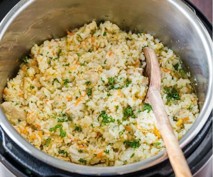 Instant Pot chicken and rice dish served with vegetables in a bowl