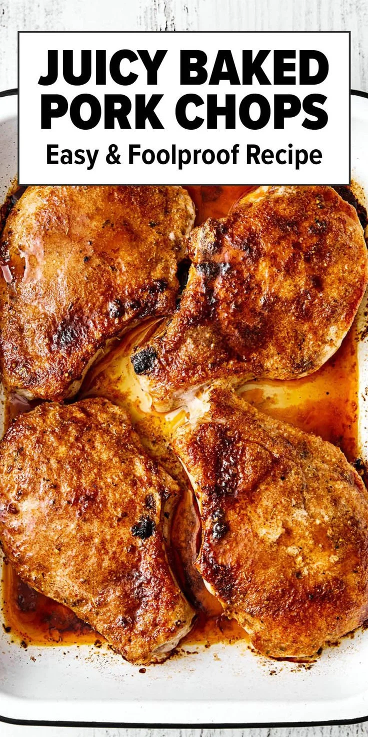 Juicy baked pork chops seasoned and cooked to perfection on a plate