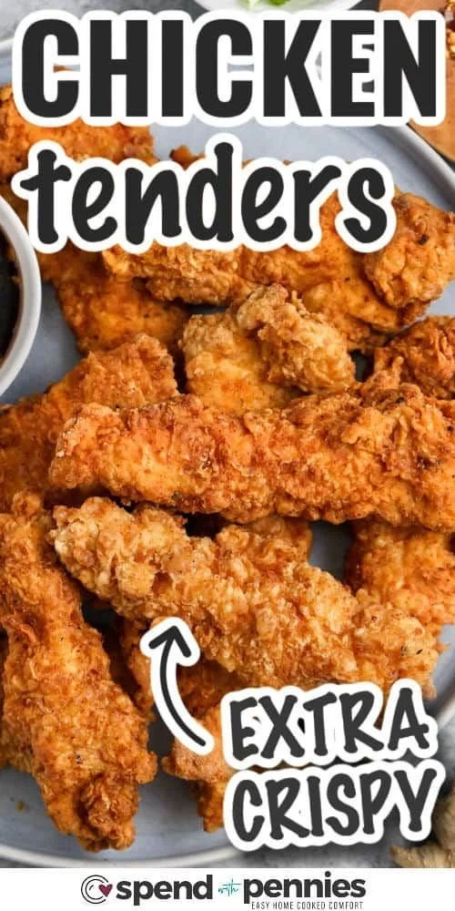 Crispy chicken tenders served with honey garlic sauce on a plate