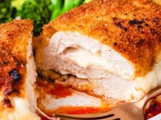 Delicious mozzarella stuffed chicken breast ready to serve