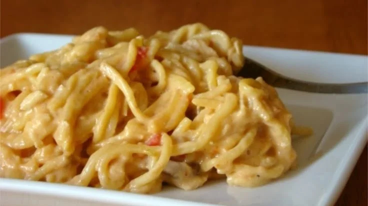 Slow Cooker Cheesy Chicken Spaghetti with Velveeta, a creamy and delicious dish