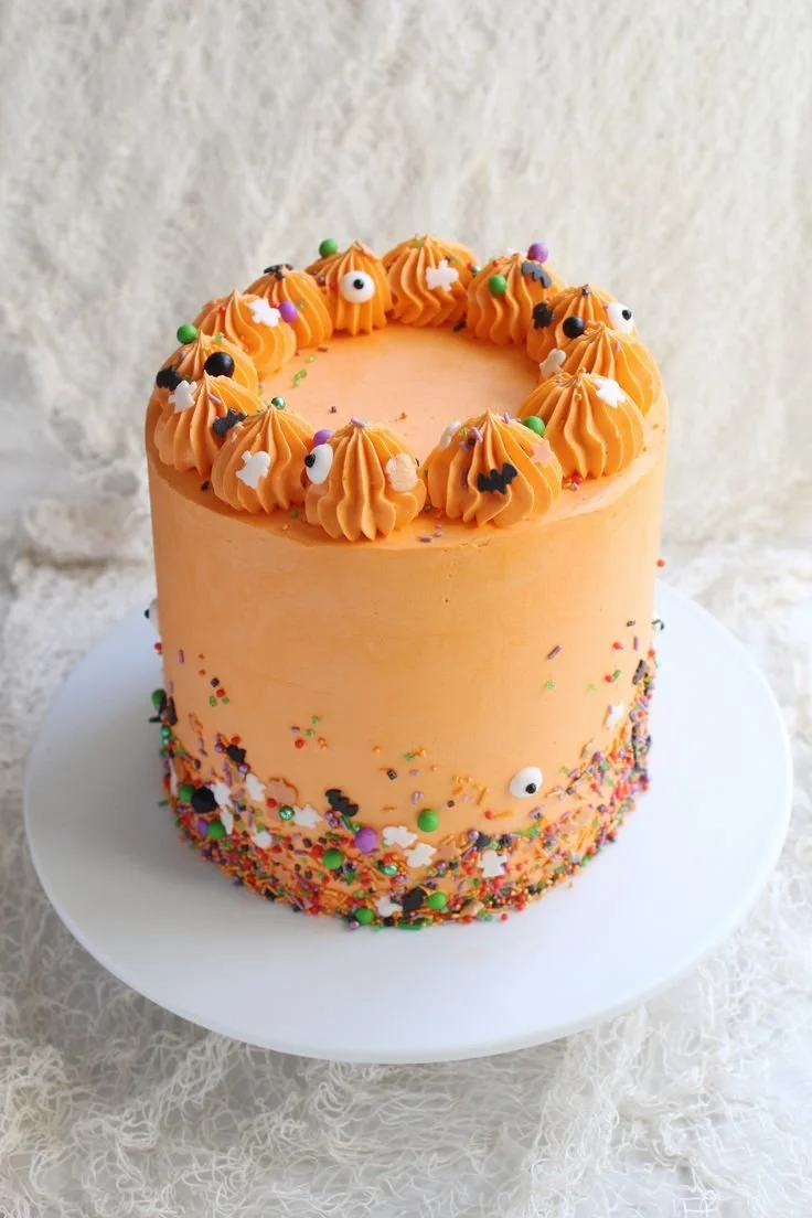 Spooky Sprinkle Halloween Cake decorated with colorful sprinkles